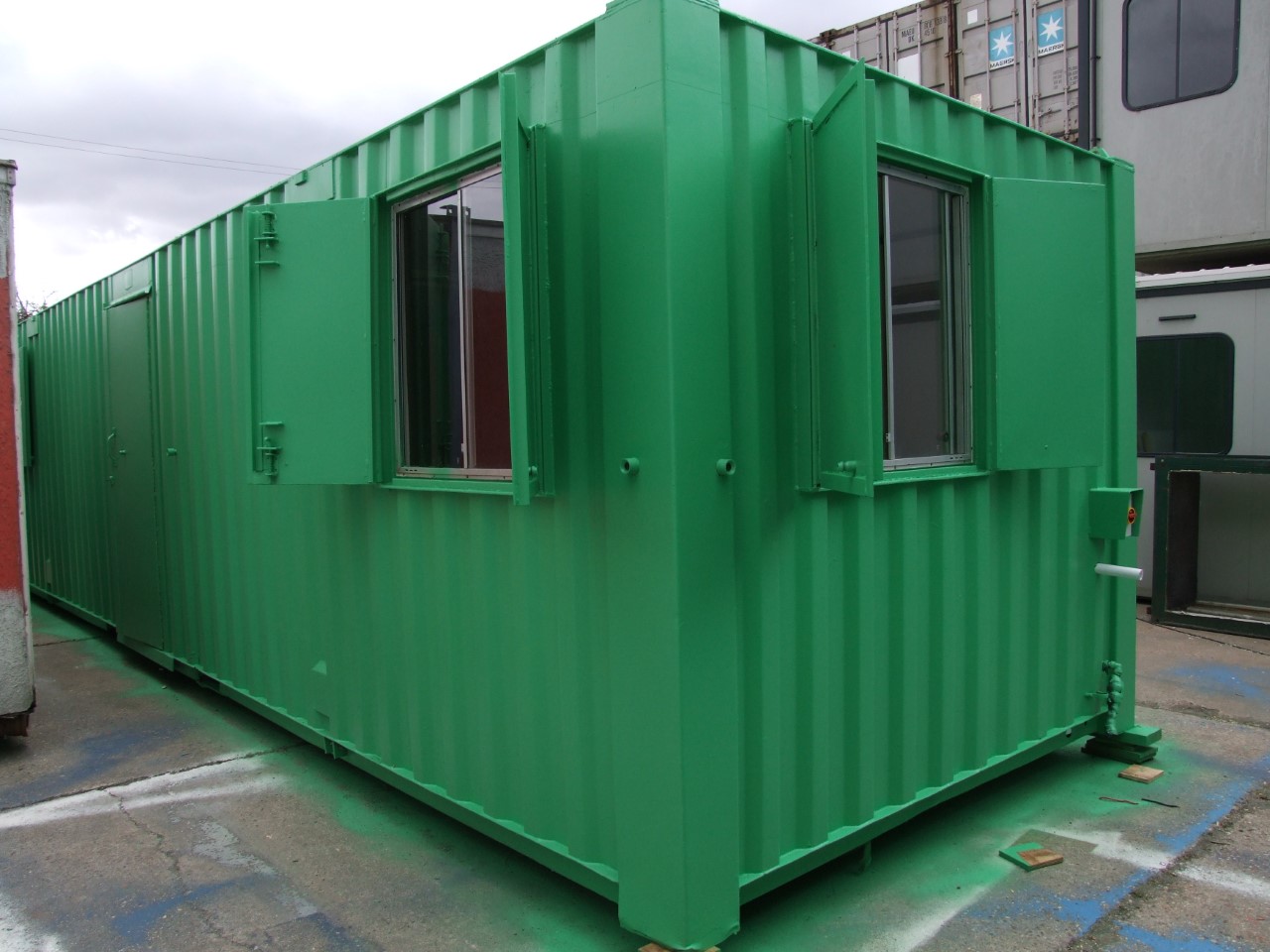 A used refurbished green site cabin