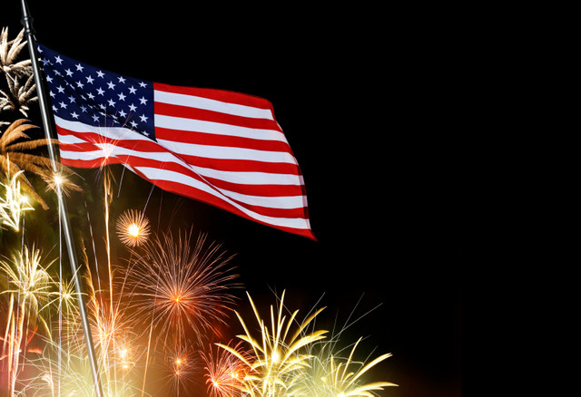 American-Flag-Infront-Of-Fireworks-i-Stock-000042103090-Small