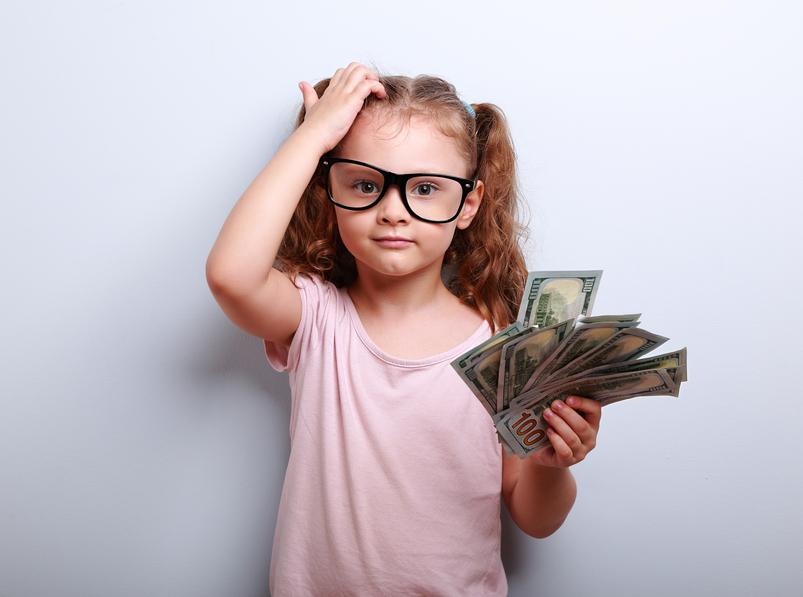 Small professor in eye glasses scratching head, holding money